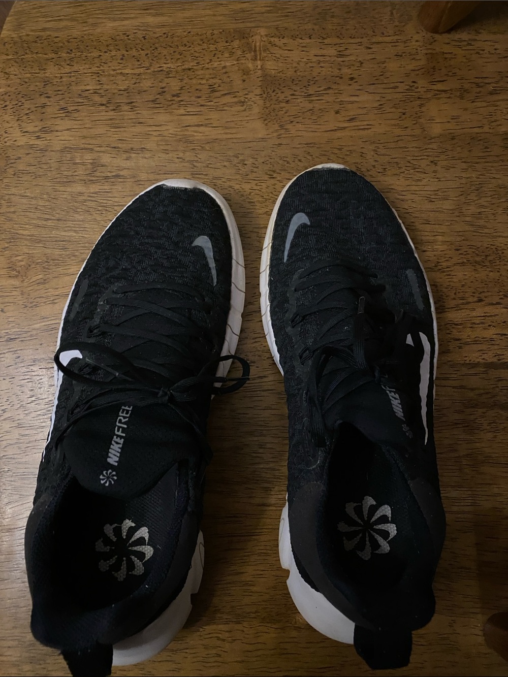 Nike women’s Black and White Athletic Running Shoes